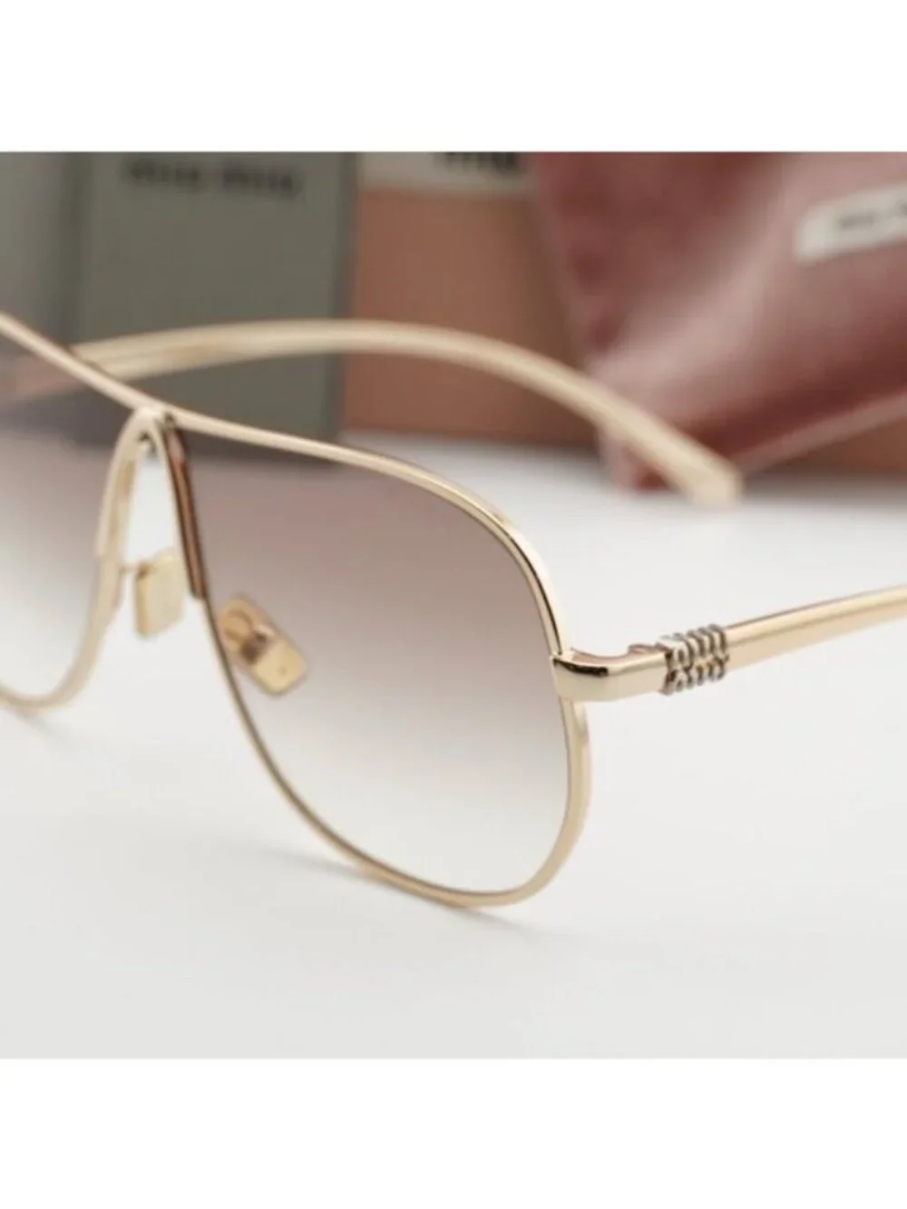 Miu Miu MUA56S 5AK90L Geometric Sunglasses – Gold/Brown Gradient